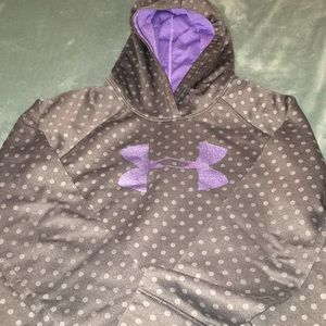 A purple spotted under armor hoodie
